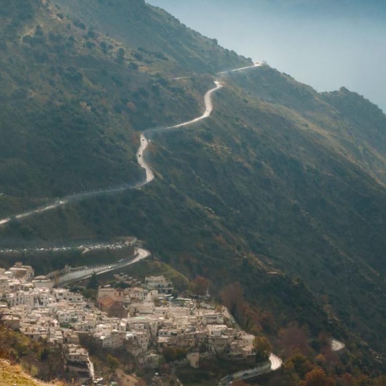 road leading to Capileira over crests