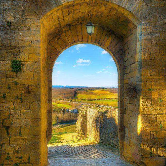 Monteriggioni medieval fortified village gateway on the via Francigena
