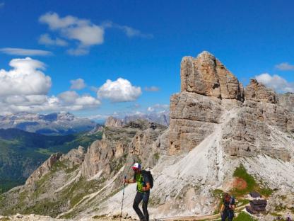 hikers along alta via 1 dolomites