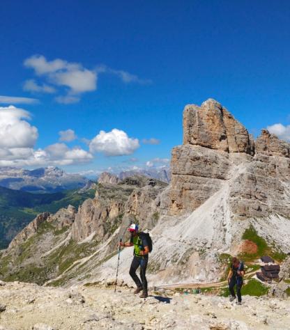 hikers along alta via 1 dolomites
