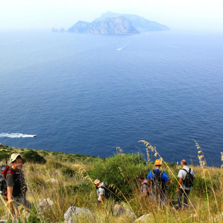 view from amalfi coast on sea with faraglioni