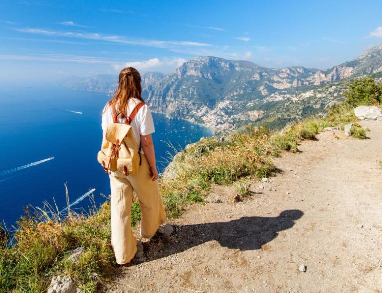 walker on path of the gods on amalfi coast