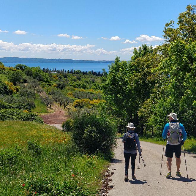 backpacking trips couple walkers on francigena path