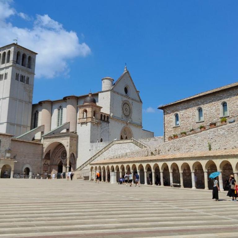 Lower square and Basilica of Saint Francis in Assisi, starting point of the St Francis pilgrimage easy version in Italy
