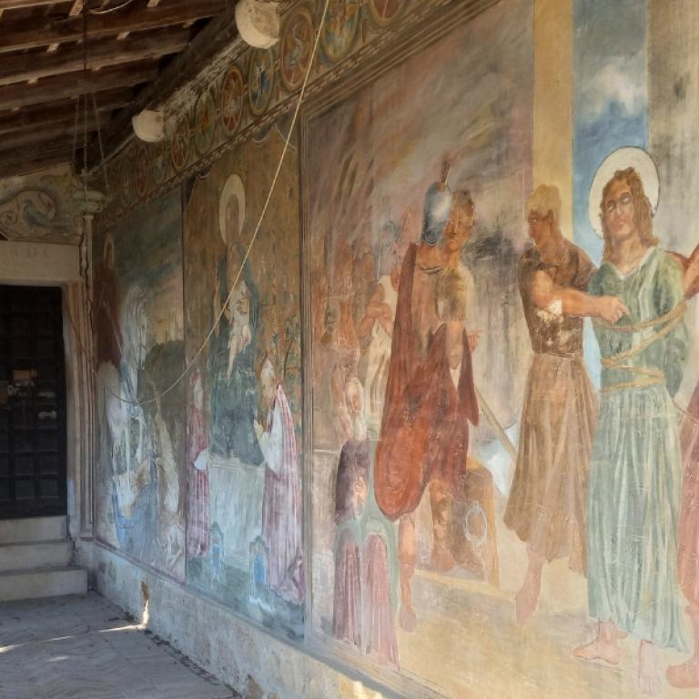 Ancient frescoed portico along the Prosecco Trail in Veneto